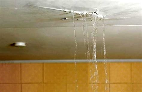 water leak upstairs bathroom|What is causing water from my upstairs bath to leak in。